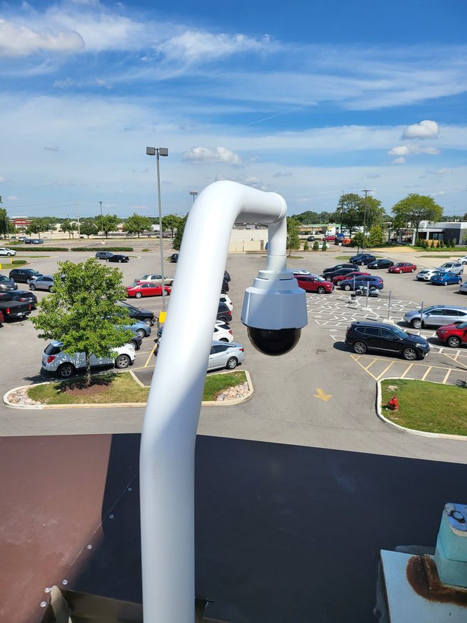 Outdoor PTZ security camera installed on commercial building by DR TEC