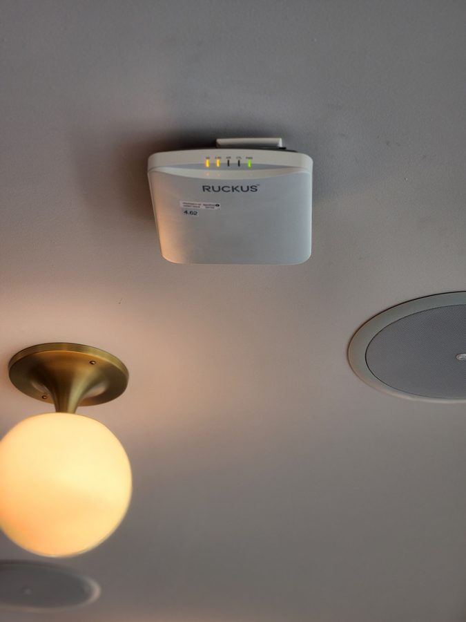 Ruckus wireless access point wall-mounted in commercial space in Chicago