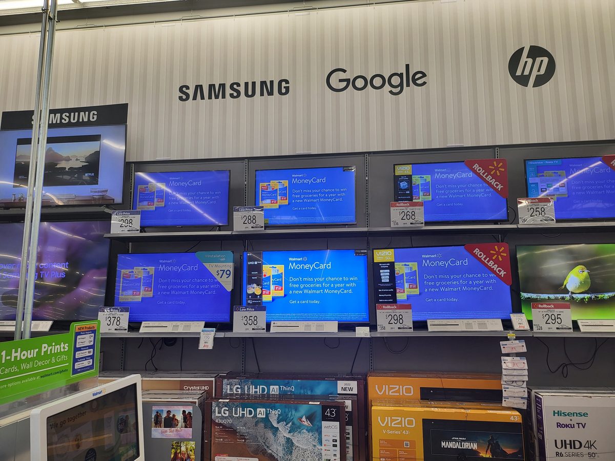 Multi-screen display wall installation at Walmart electronics department
